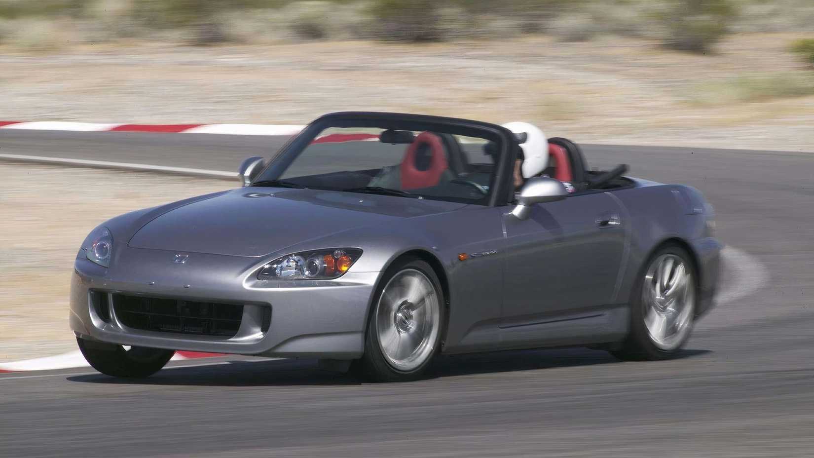 Front 3/4 action shot of a 2004 Honda S2000