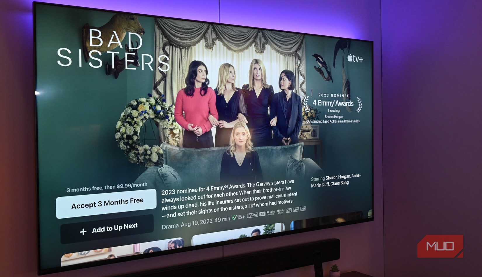 Colored lights behind a Smart TV with Apple TV open